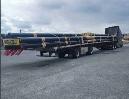 Transporting Pipes on Trucks – Connect Express LLC